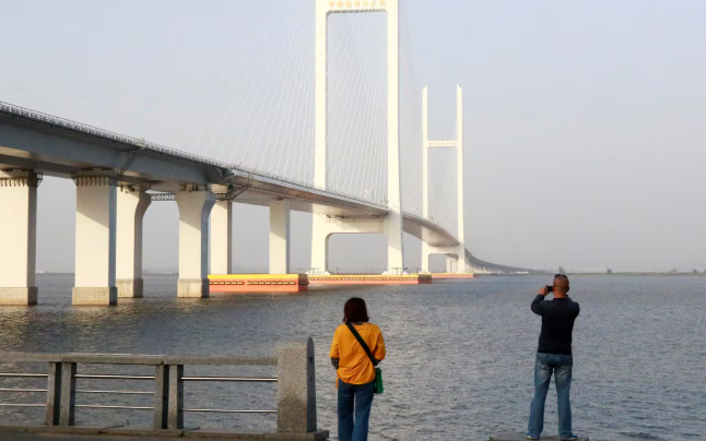 New bridge linking China, North Korea will open more than a decade late